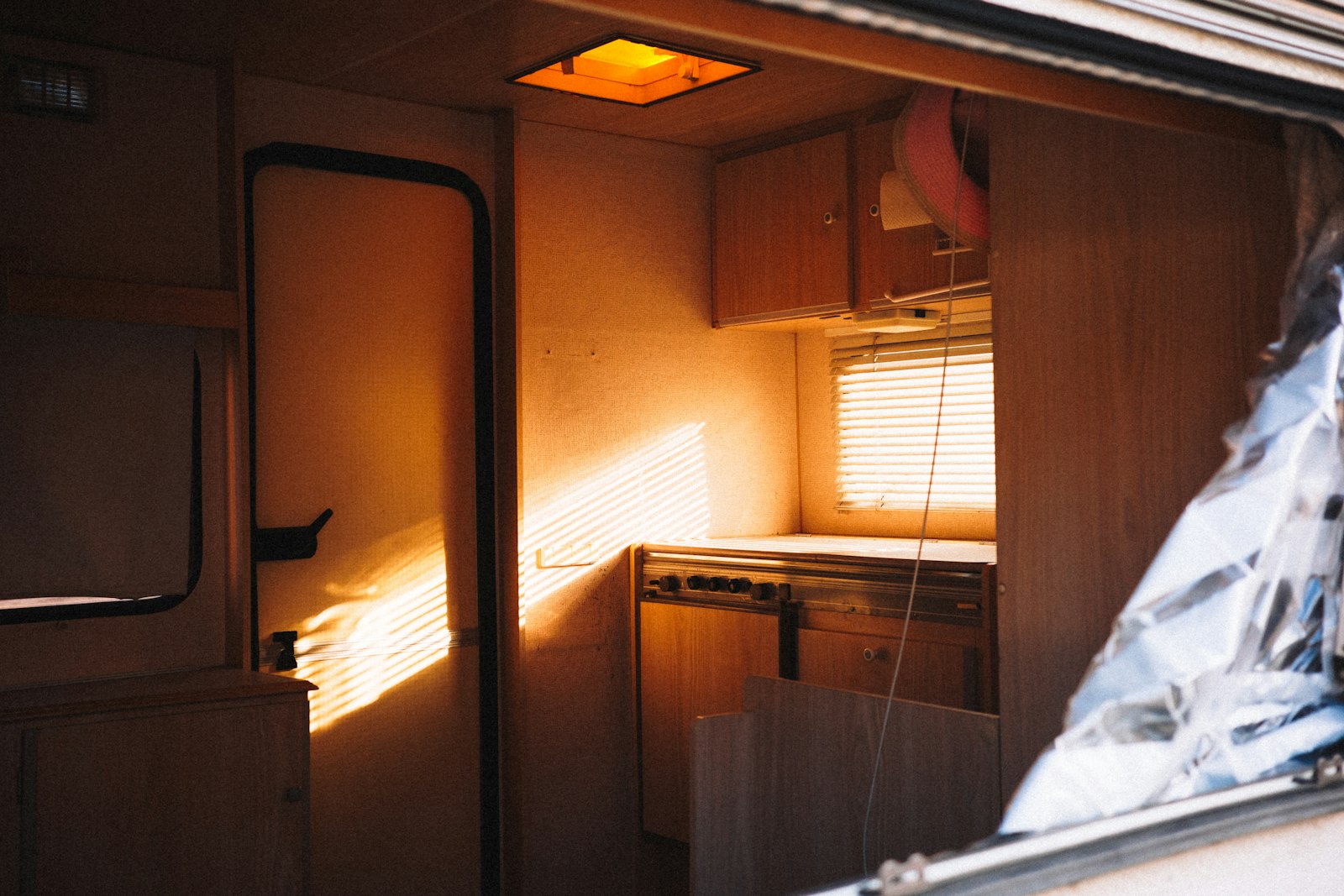 Clean camper van interior with sunlight streaming in