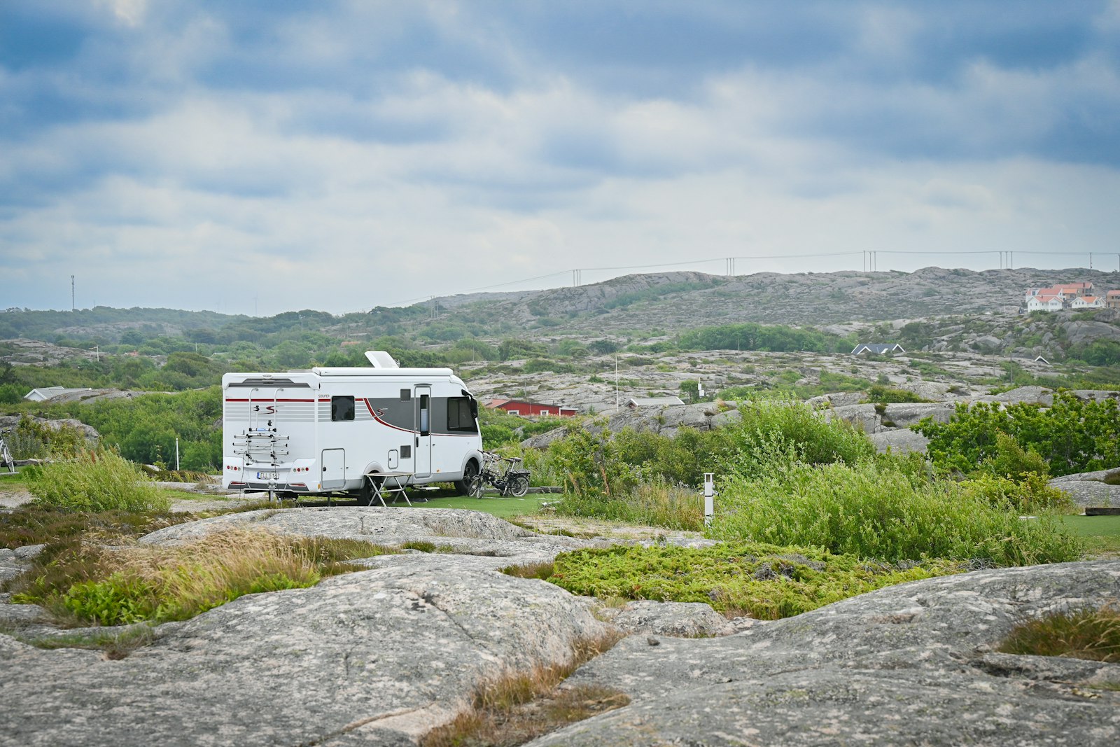 Fully detailed white motorhome on the road