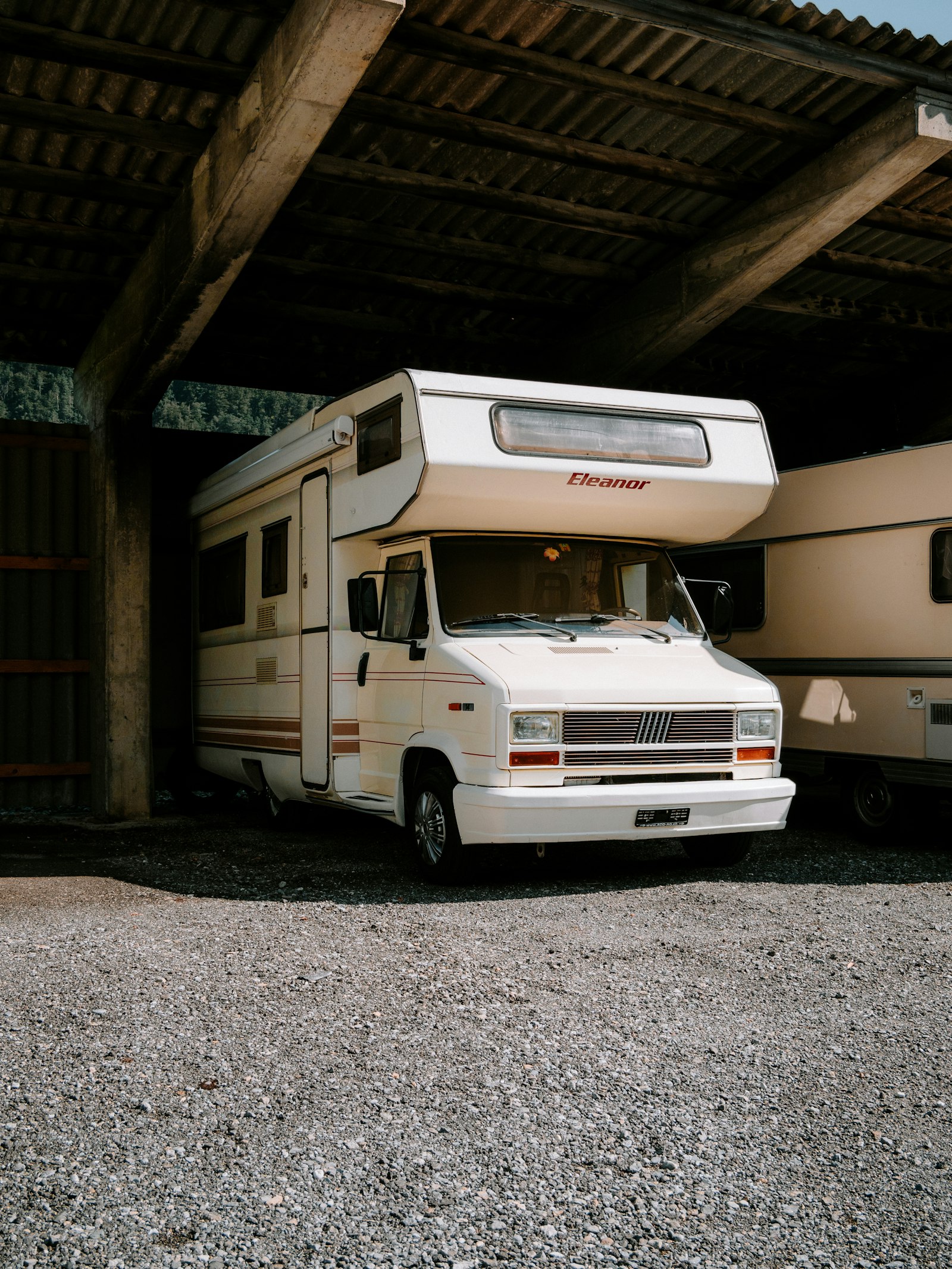 RVs parked inside a service bay ready for cleaning